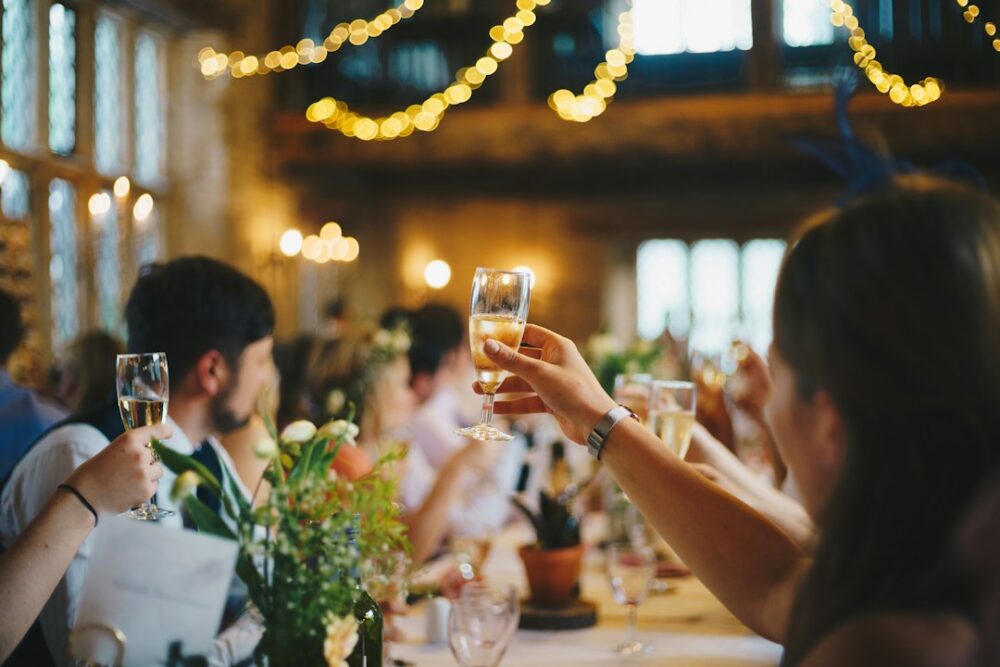 Guests cheering at a wedding event